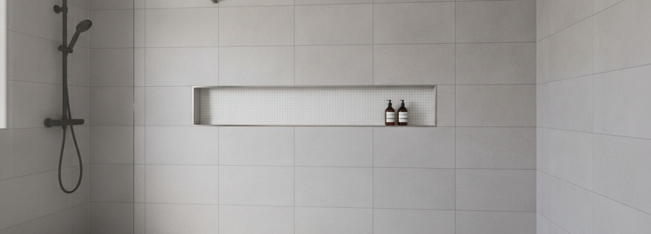 Tegelzetter Hoe een nis in je douche het tegelplan beïnvloedt.
